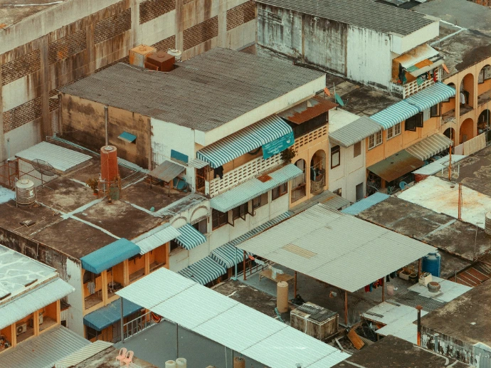 an aerial view of a city with lots of buildings